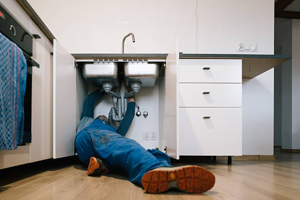 Professional Emergency Plumber technician working in Upton, NY